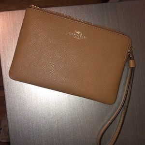 Tan leather coach wristlet